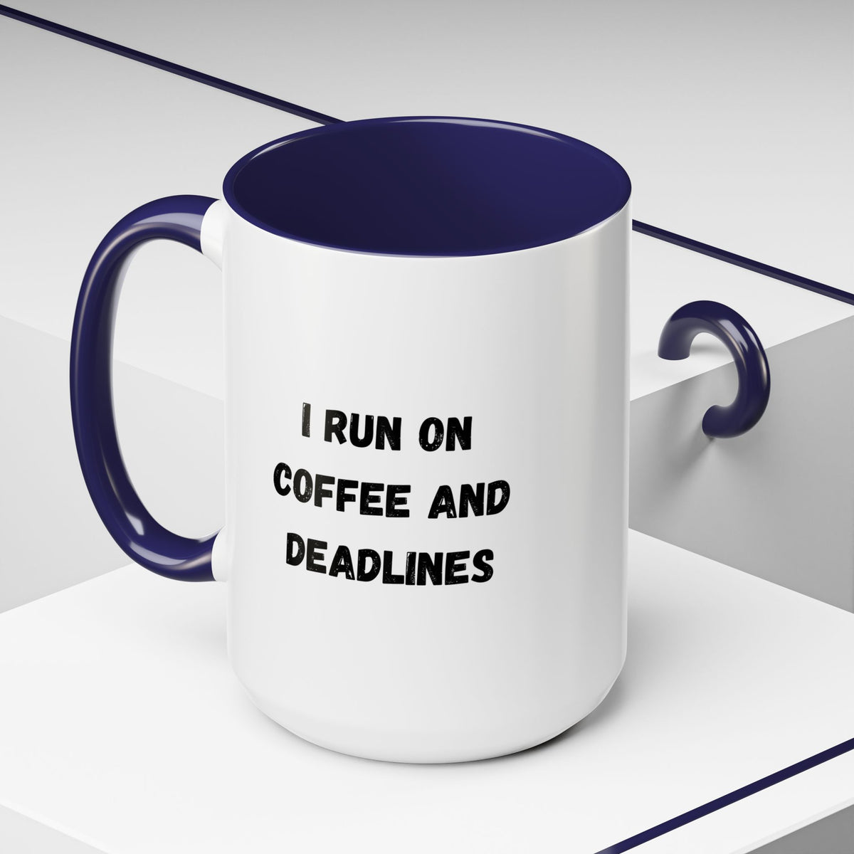 White ceramic coffee mug with black text reading "I Run on Coffee and Deadlines" from Printify, viewed from the front.