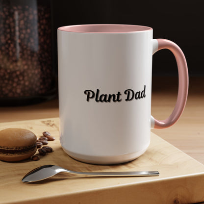 Black-handle Plant Dad coffee mug with plant-themed design, perfect for plant lovers, available in 11oz and 15oz sizes.