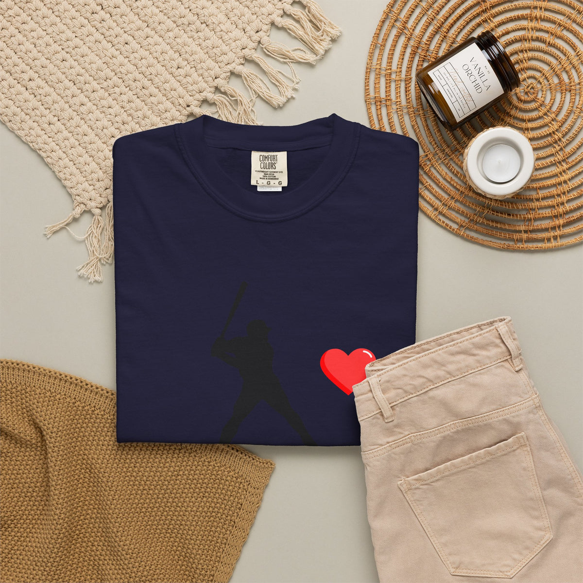White baseball batter heart T-shirt by Printify featuring a graphic of a batter swinging a bat on the front.