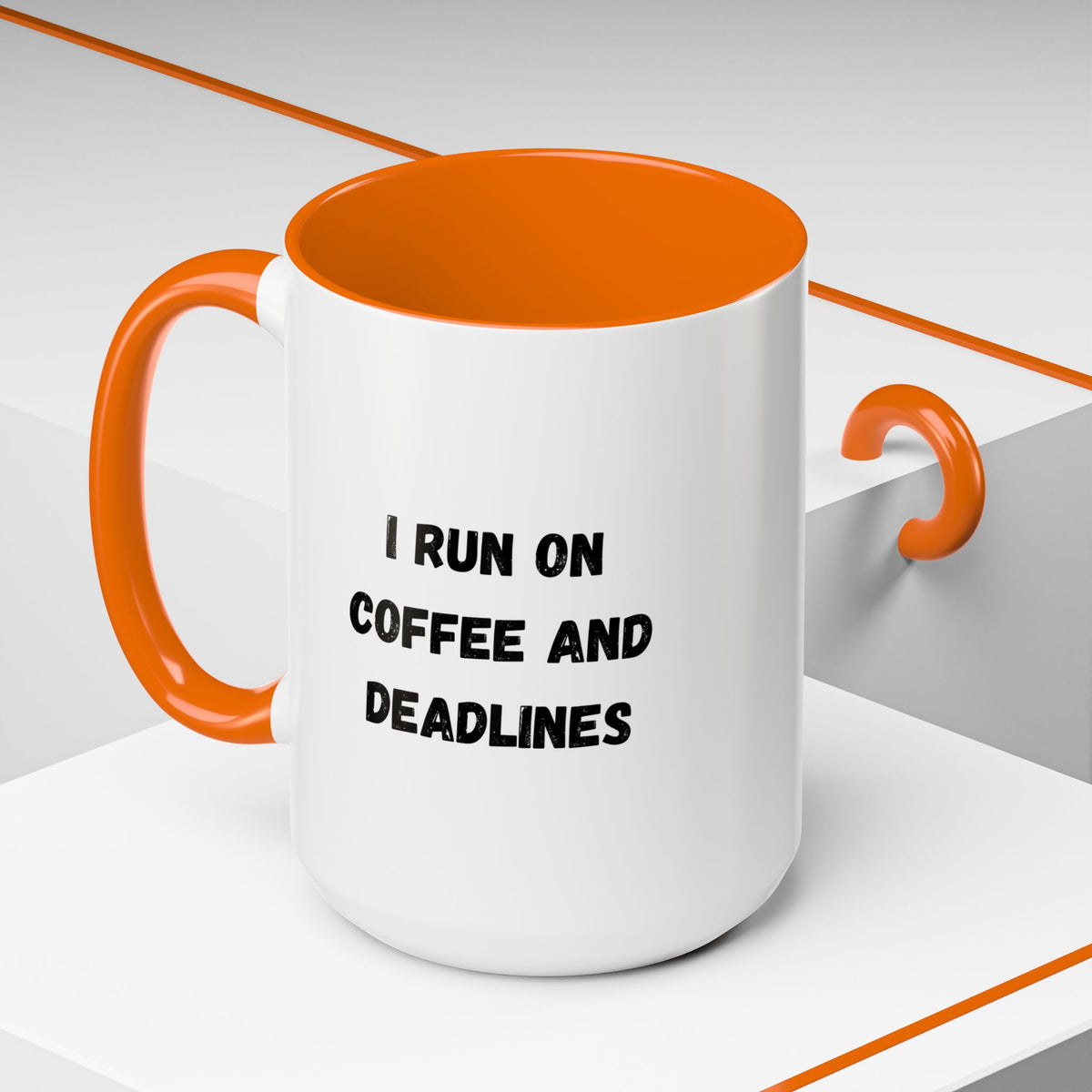 White ceramic coffee mug with black text that reads "I Run on Coffee and Deadlines" in a stylish font.
