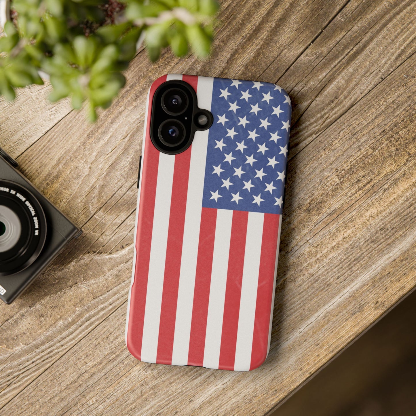 Durable American flag phone case for iPhone with patriotic design, made by Printify, providing rugged protection.