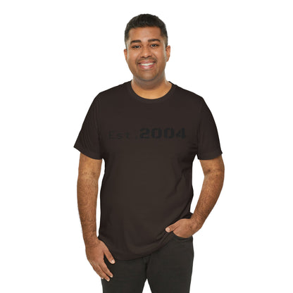 Vintage-style Est. 2004 T-Shirt by Printify featuring minimal design and classic birth year graphic on soft fabric.