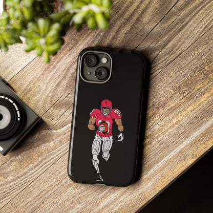 Black football player tough phone case for iPhone, durable sports-themed protective case by Printify showing athletic design.