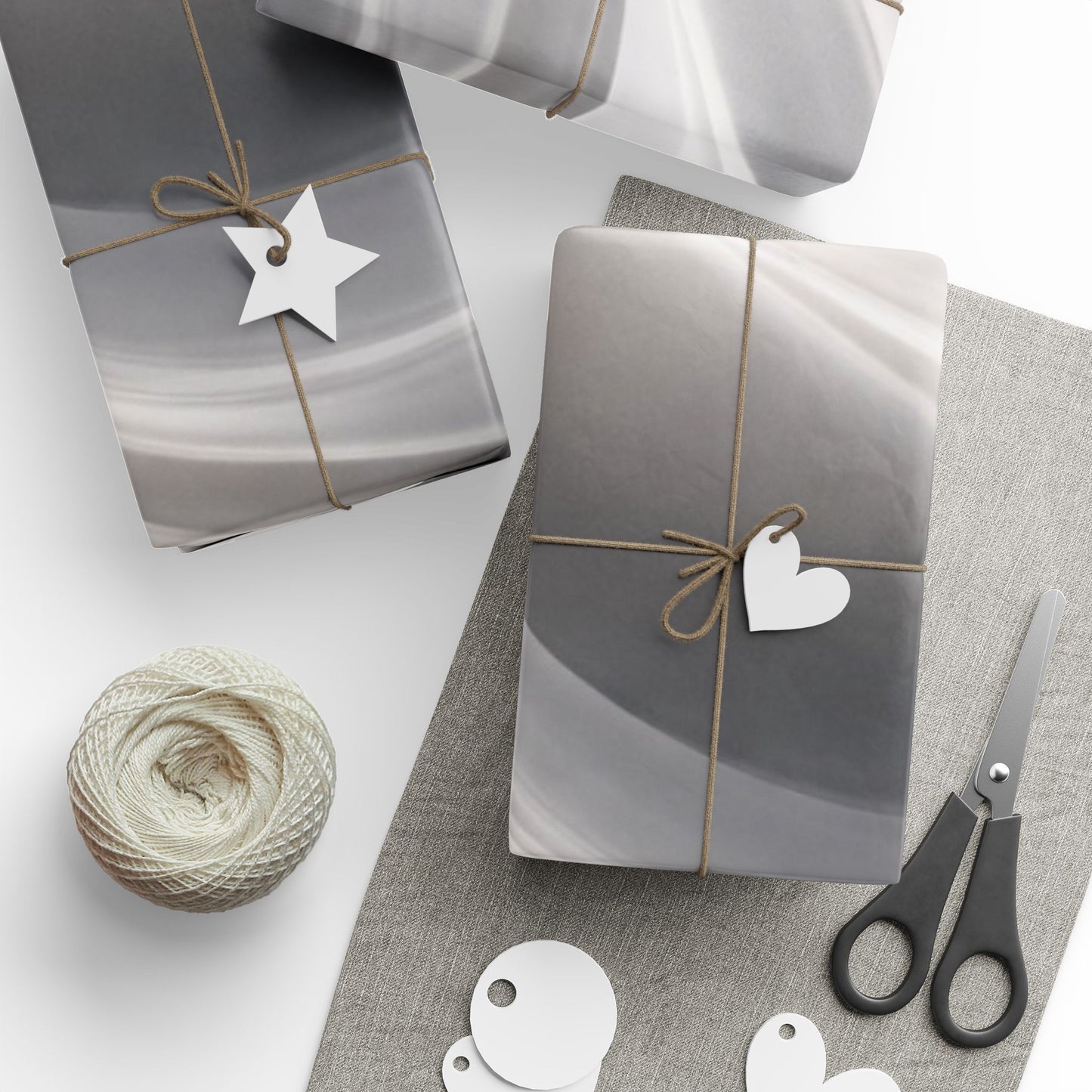 Silver marble swirl wrapping paper with abstract metallic finish, featuring a stylish marble pattern on high-quality gift wrap.