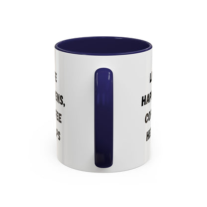 Black ceramic mug with "Life Happens Coffee Helps" text, 11oz or 15oz size, featuring a black handle and rim.