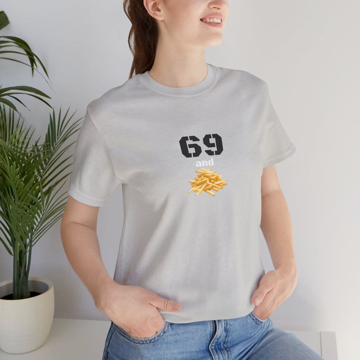 Unisex graphic T-shirt featuring a humorous 69 and French fries design in bold print, casual and quirky style.