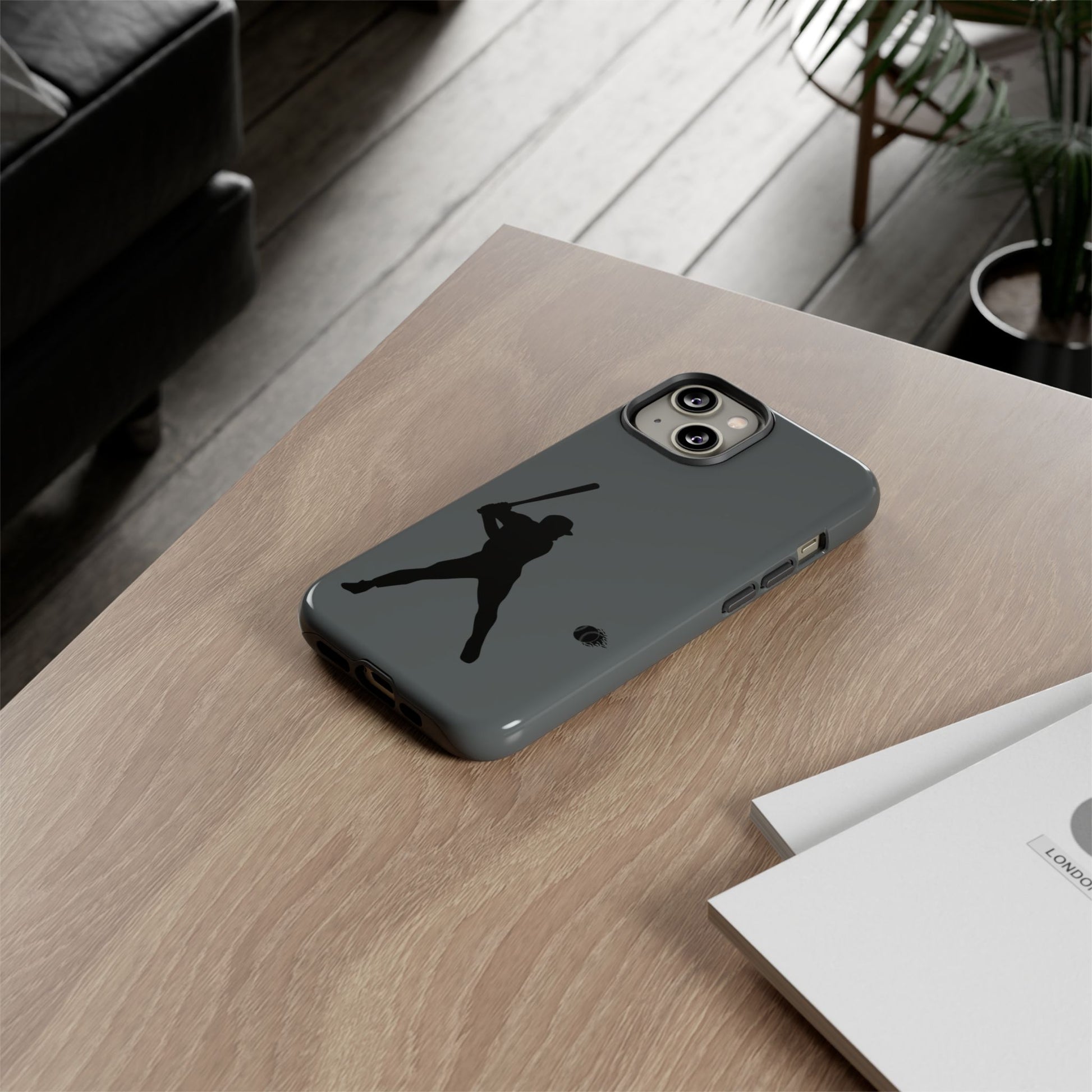 Black baseball silhouette tough phone case for iPhone, protective sporty design by Printify, with bold baseball graphic.