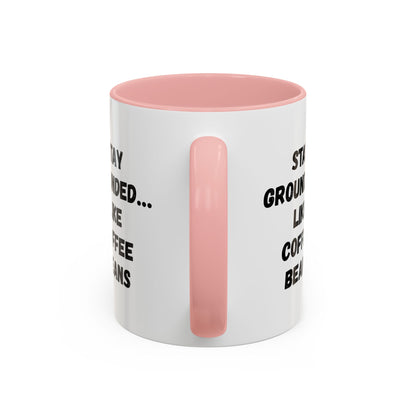 White ceramic coffee mug with "Stay Grounded Like Coffee Beans" printed design, perfect for coffee lovers, 11oz size.