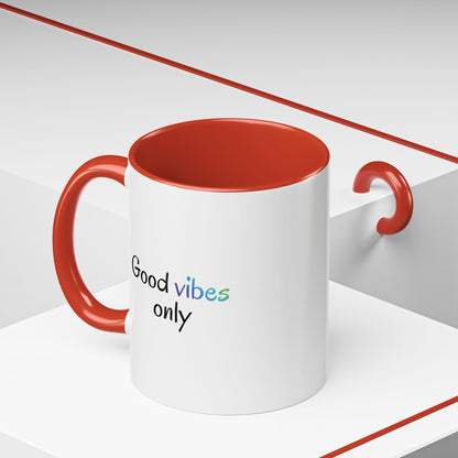 White ceramic coffee mug with "Good Vibes Only" positive quote, ideal for morning inspiration and tea or coffee drinking.