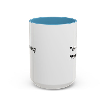 Ceramic coffee mug with "Not a Morning Person" slogan in black print, 11oz size, on a white background.