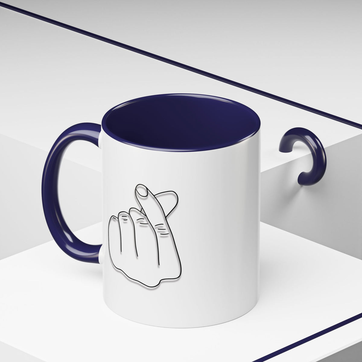 Minimal Korean finger heart accent mug by Printify, 11oz or 15oz ceramic coffee mug with simple design and clean finish.