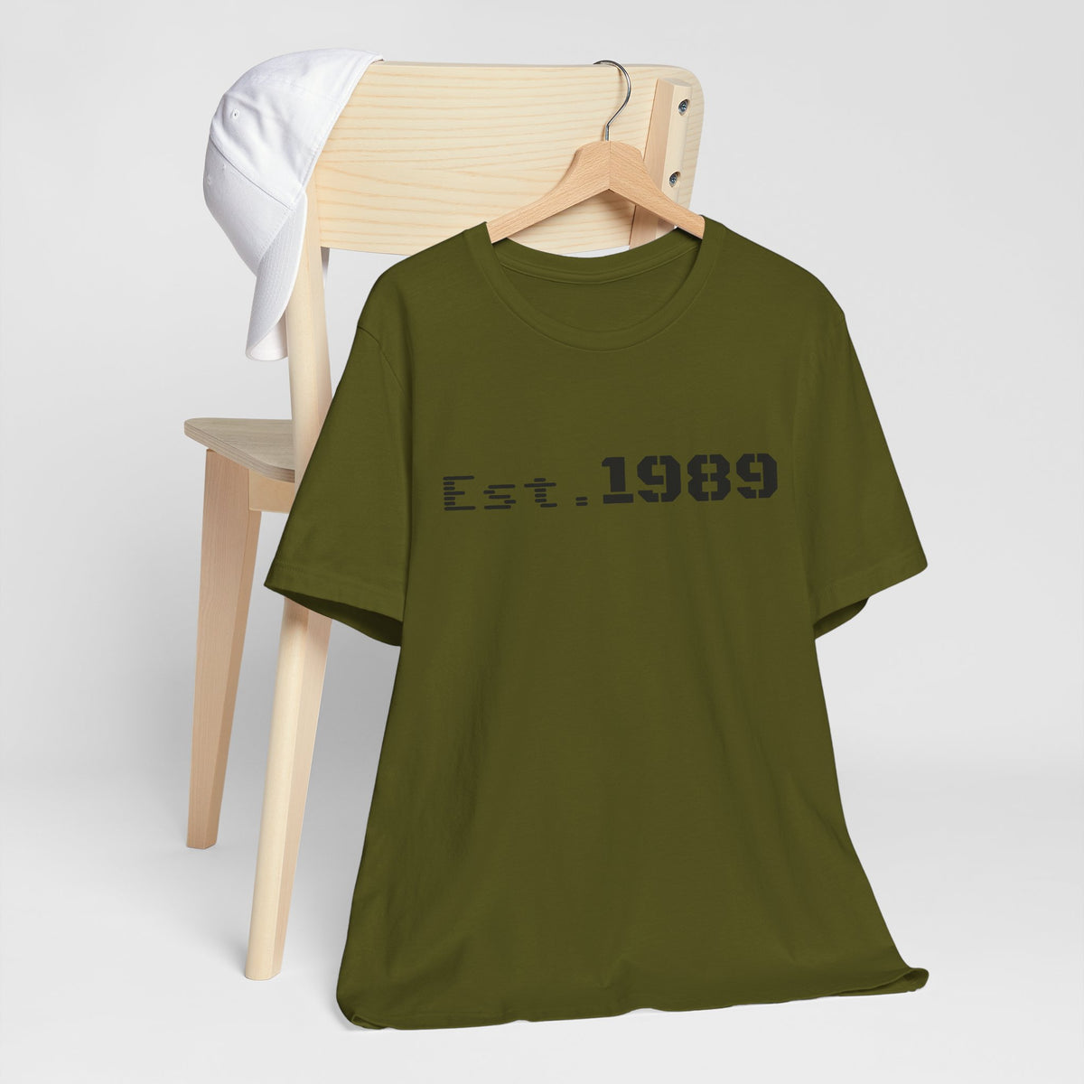 Vintage Est. 1989 T-Shirt by Printify featuring a graphic design celebrating the year of birth.