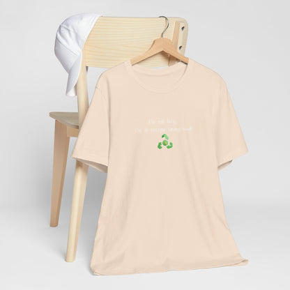 Light gray energy-saving mock T-shirt with humorous text "I’m Not Lazy, I’m an Energy-Saving Mock" from Printify.