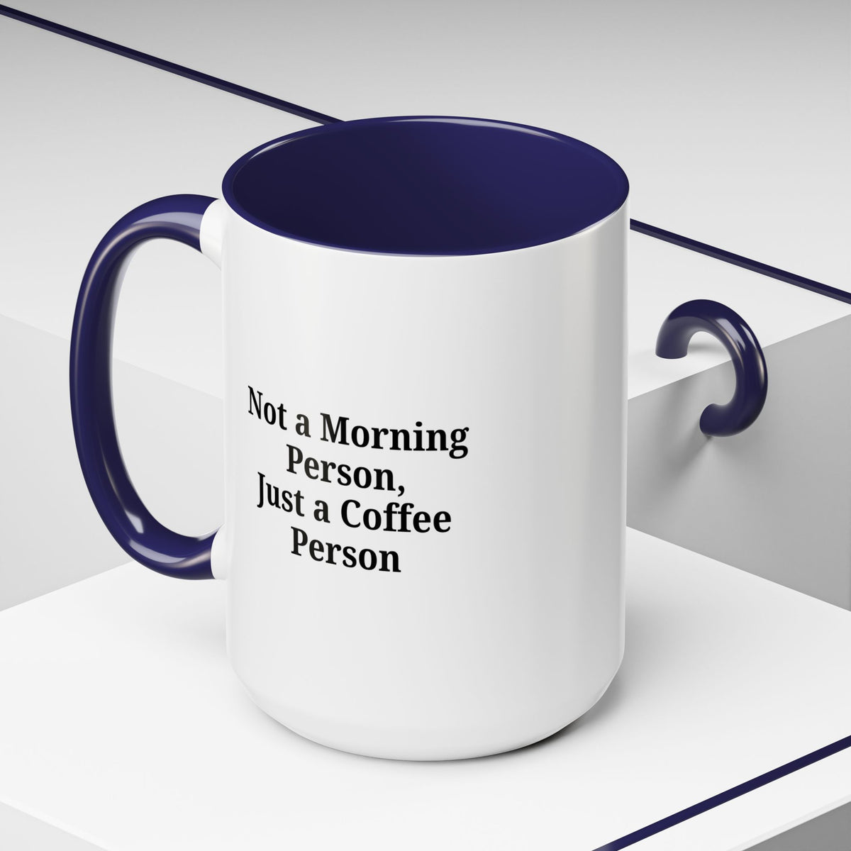 Ceramic coffee mug with "Not a Morning Person, Just a Coffee Person" print, designed for coffee lovers.