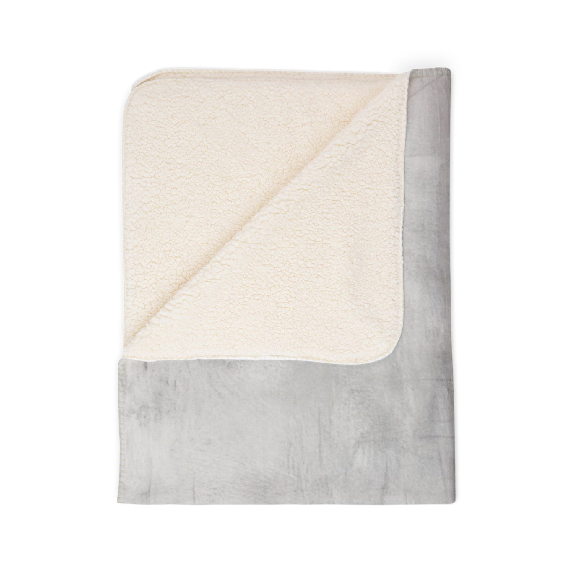 Soft Sherpa fleece throw blanket by Printify, perfect for cozy winter home decor and adding warmth to any space.