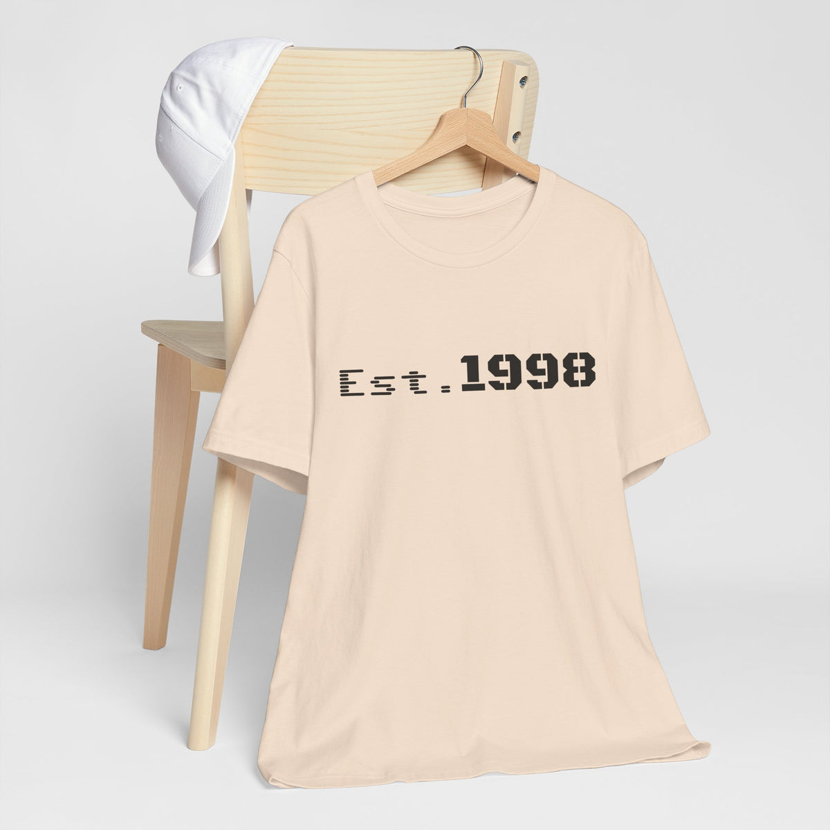 Vintage Est. 1998 T-Shirt by Printify featuring a graphic design celebrating the year of birth.