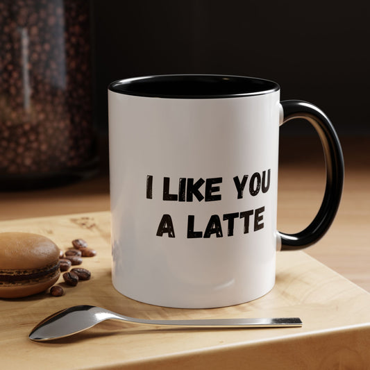 White ceramic mug with "I Like You a Latte" printed in black, perfect for coffee lovers and gift-giving.