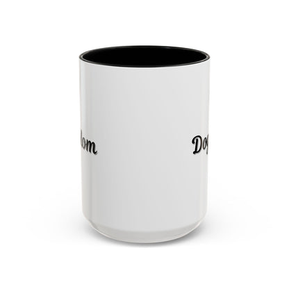 Dog Mom Accent Coffee Mug — white ceramic coffee mug with retro script "Dog Mom" print, colored interior and C-handle, 11oz/15oz, styled lifestyle product photo