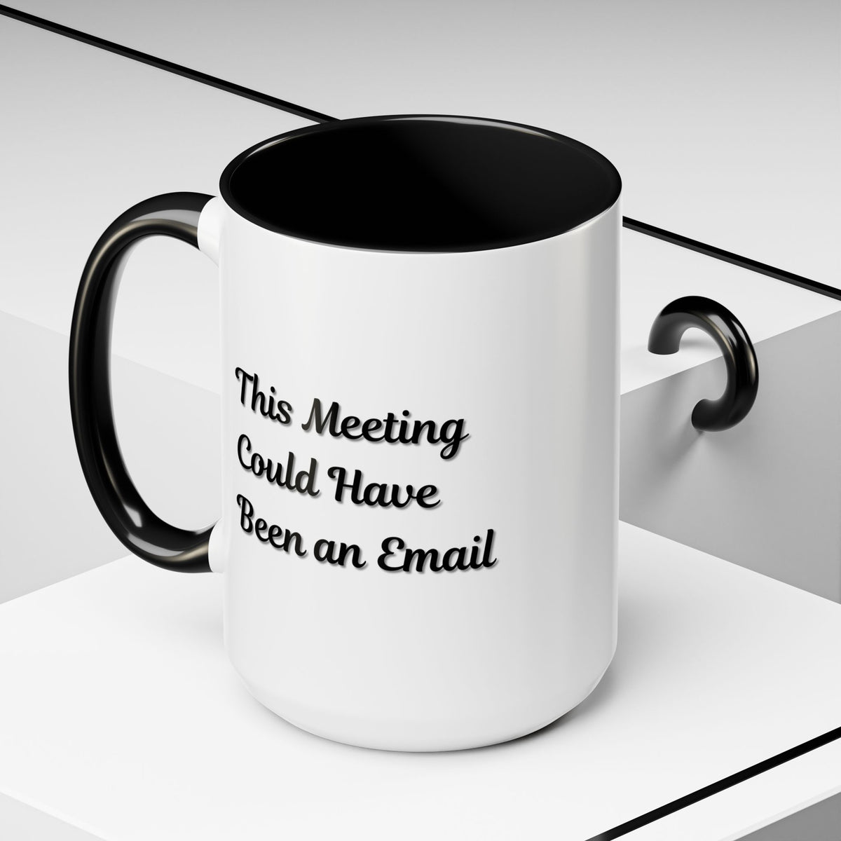 Funny office coffee mug with "This Meeting Could Have Been An Email" printed in black text, ideal for desk or office use.