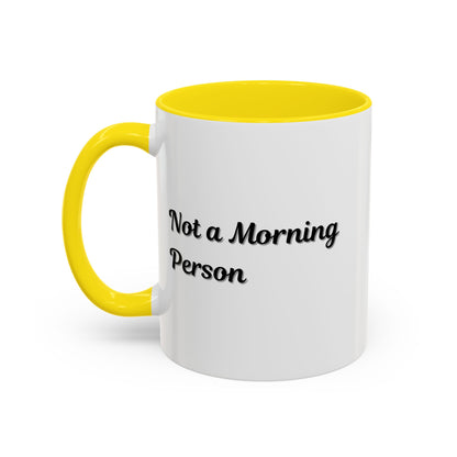 Ceramic "Not a Morning Person" coffee mug by Printify, 11oz or 15oz size, with bold black text on a white mug, suitable for hot beverages.