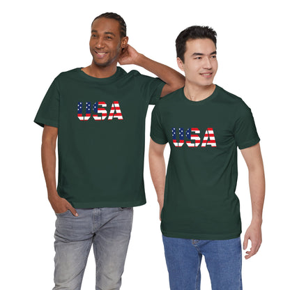 Red, white, and blue USA flag text T-shirt by Printify featuring patriotic Fourth of July design and bold flag graphics.