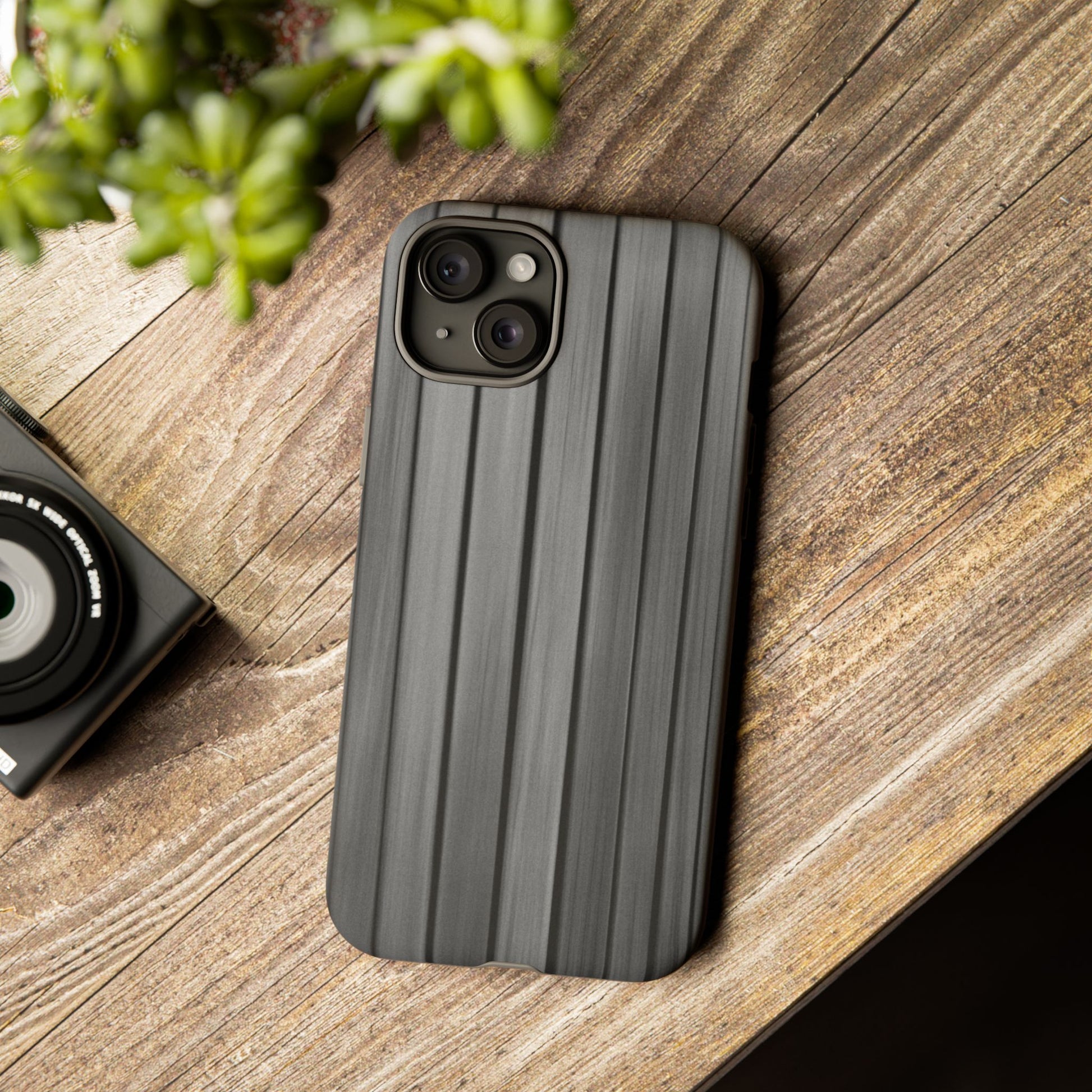 Ribbed metal texture phone case for iPhone, tough protective cover by Printify with durable metal-style design.