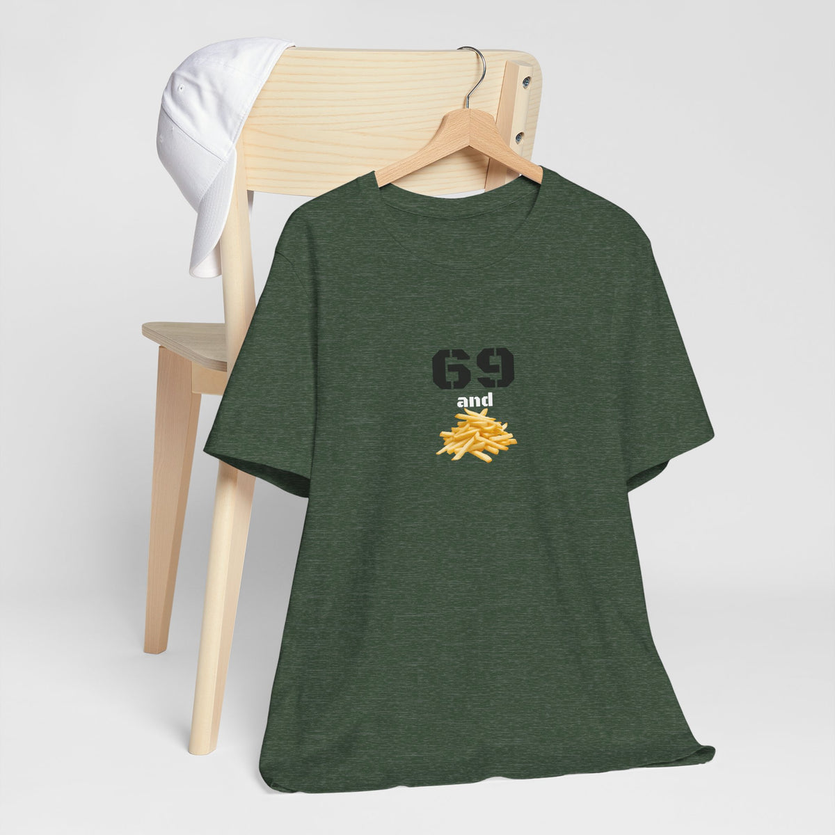 Unisex graphic T-shirt featuring a humorous 69 and French fries design in black and white print.