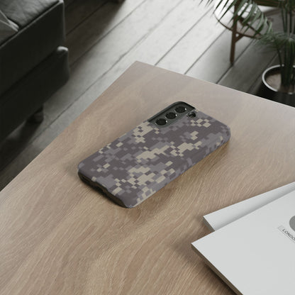 Rugged digital camo Printify tough phone case protecting a smartphone from scratches and drops with durable design.