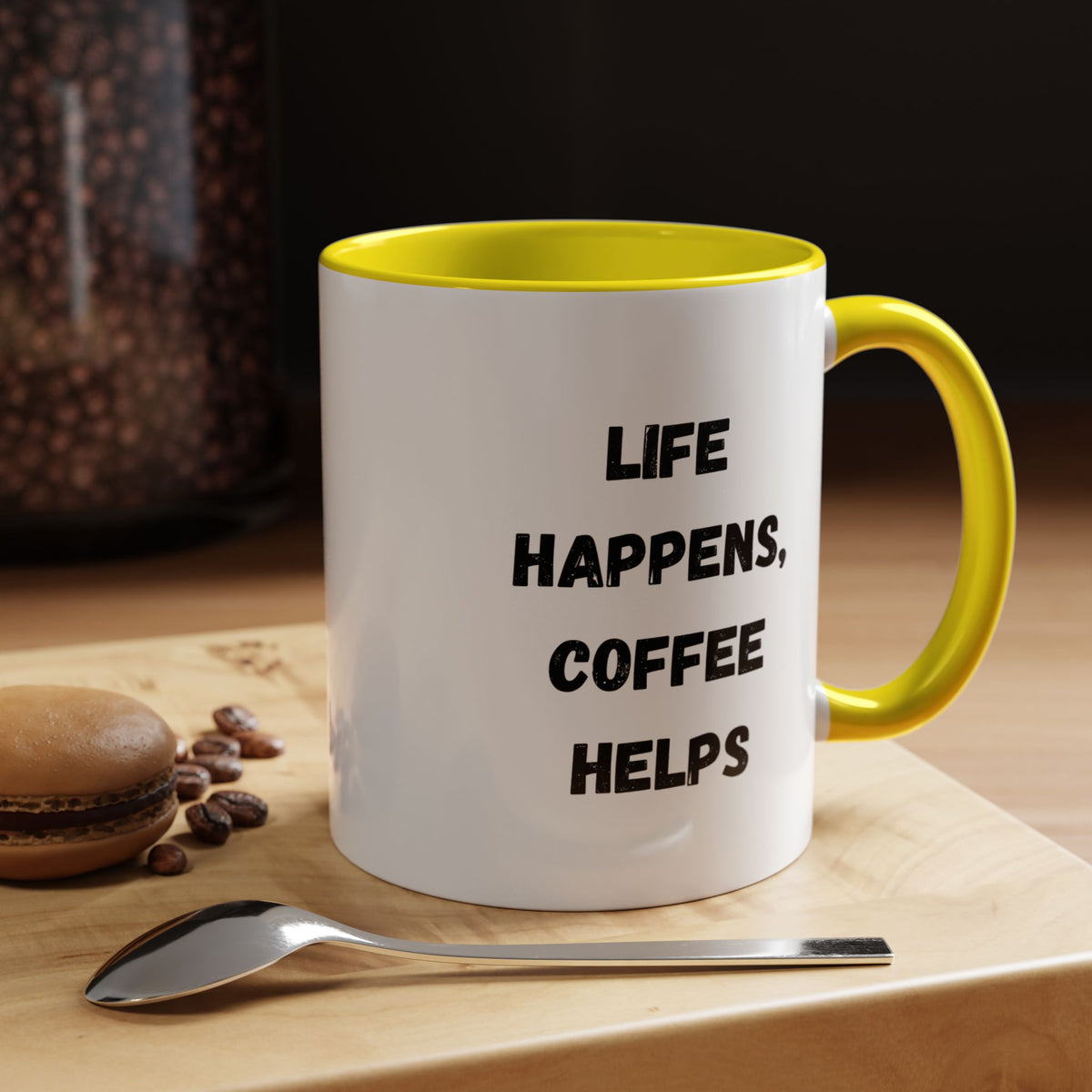 Black ceramic mug with "Life Happens Coffee Helps" slogan, 11oz size, with black handle and rim, by Printify.