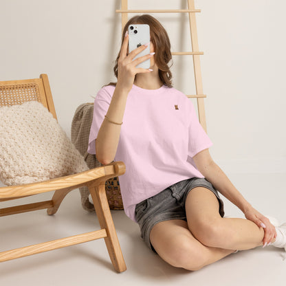 Cute brown kitten graphic T-shirt for cat lovers, featuring a playful design on a comfortable Printify T-shirt.