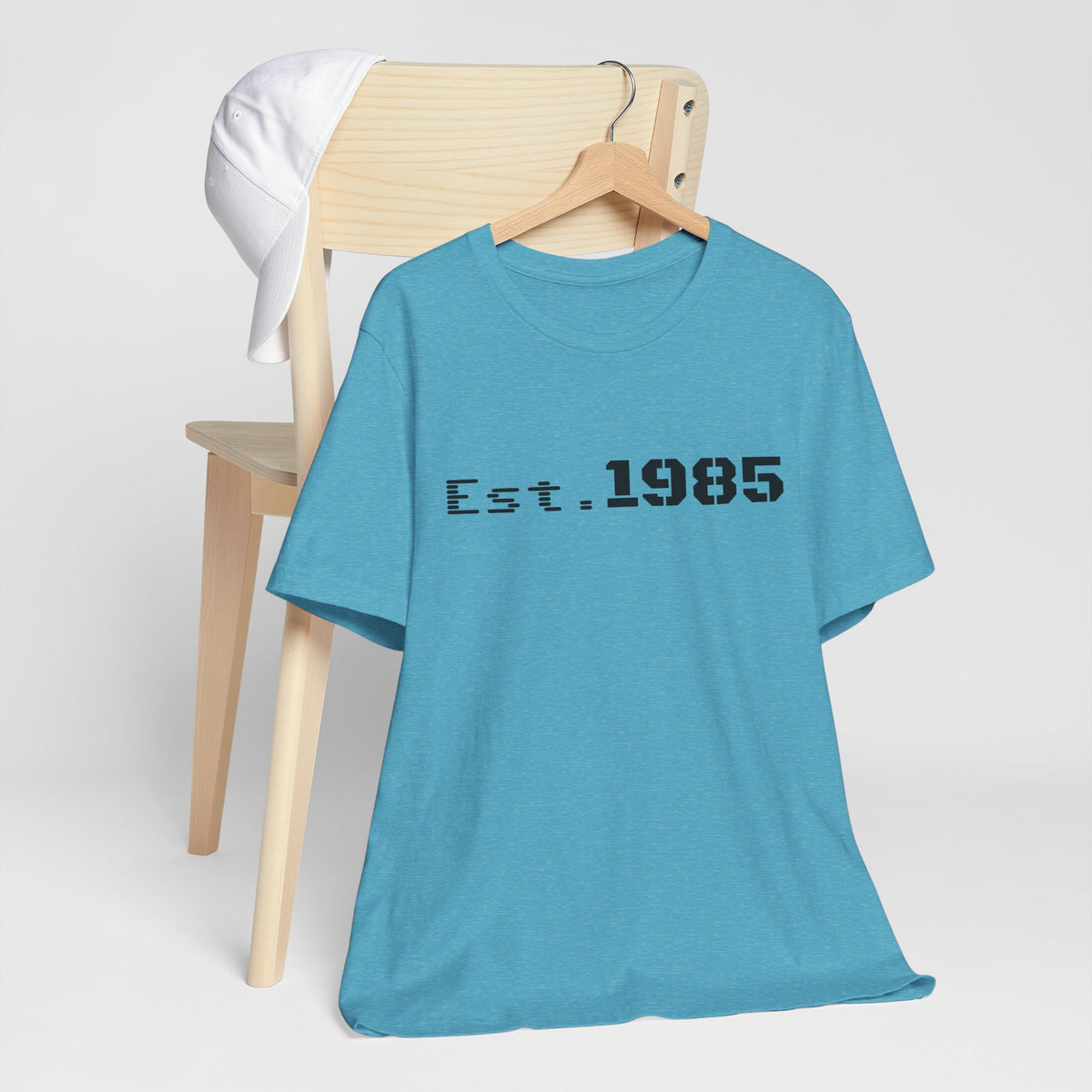Vintage year graphic T-shirt from Printify, featuring "Est. 1985" design on a classic casual T-shirt.