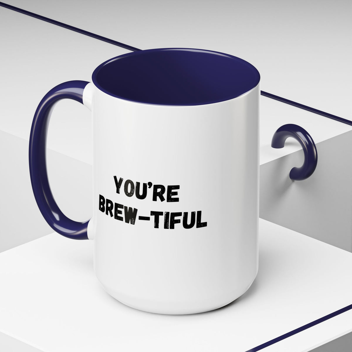 You’re Brew-tiful Coffee Mug – Cute Coffee Pun Accent Mug (11/15oz) — white ceramic accent mug with glossy finish and bold black “YOU’RE BREW-TIFUL” print, angled view