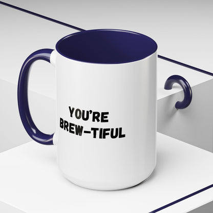 You’re Brew-tiful Coffee Mug – Cute Coffee Pun Accent Mug (11/15oz) — white ceramic accent mug with glossy finish and bold black “YOU’RE BREW-TIFUL” print, angled view