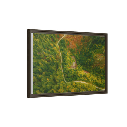 Colorful framed matte canvas wall art featuring an aerial forest path landscape by Printify.