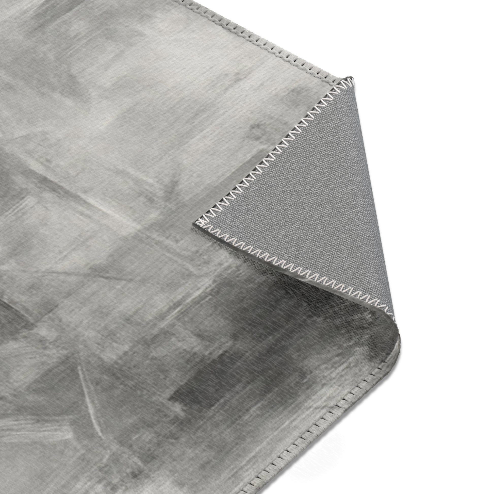 Abstract gray watercolor area rug by Printify, modern neutral design perfect for living room accents.