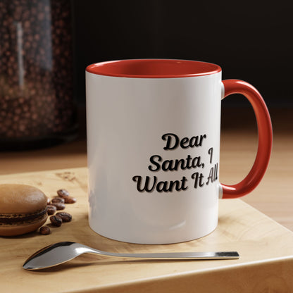 White ceramic coffee mug with "Dear Santa I Want It All" holiday Christmas design, ideal for festive gift-giving.