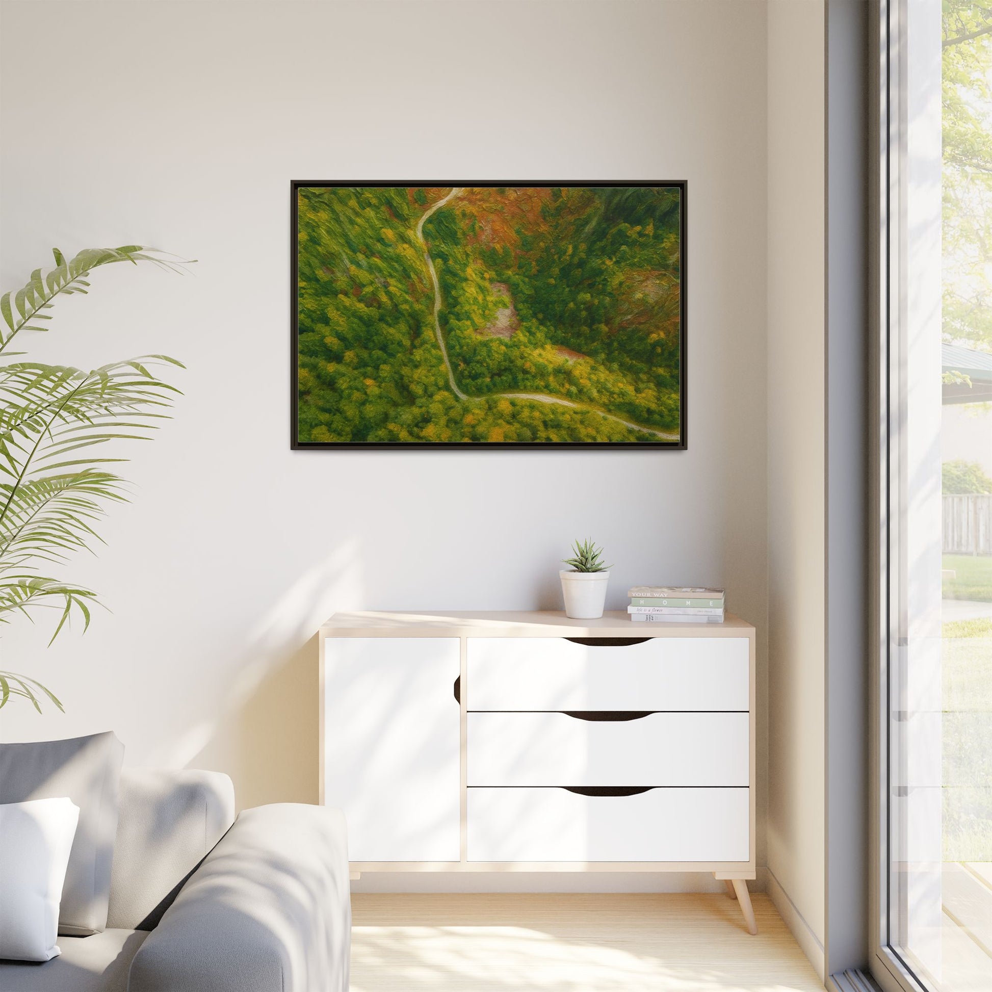 Framed matte canvas wall art featuring a colorful aerial forest path landscape by Printify.