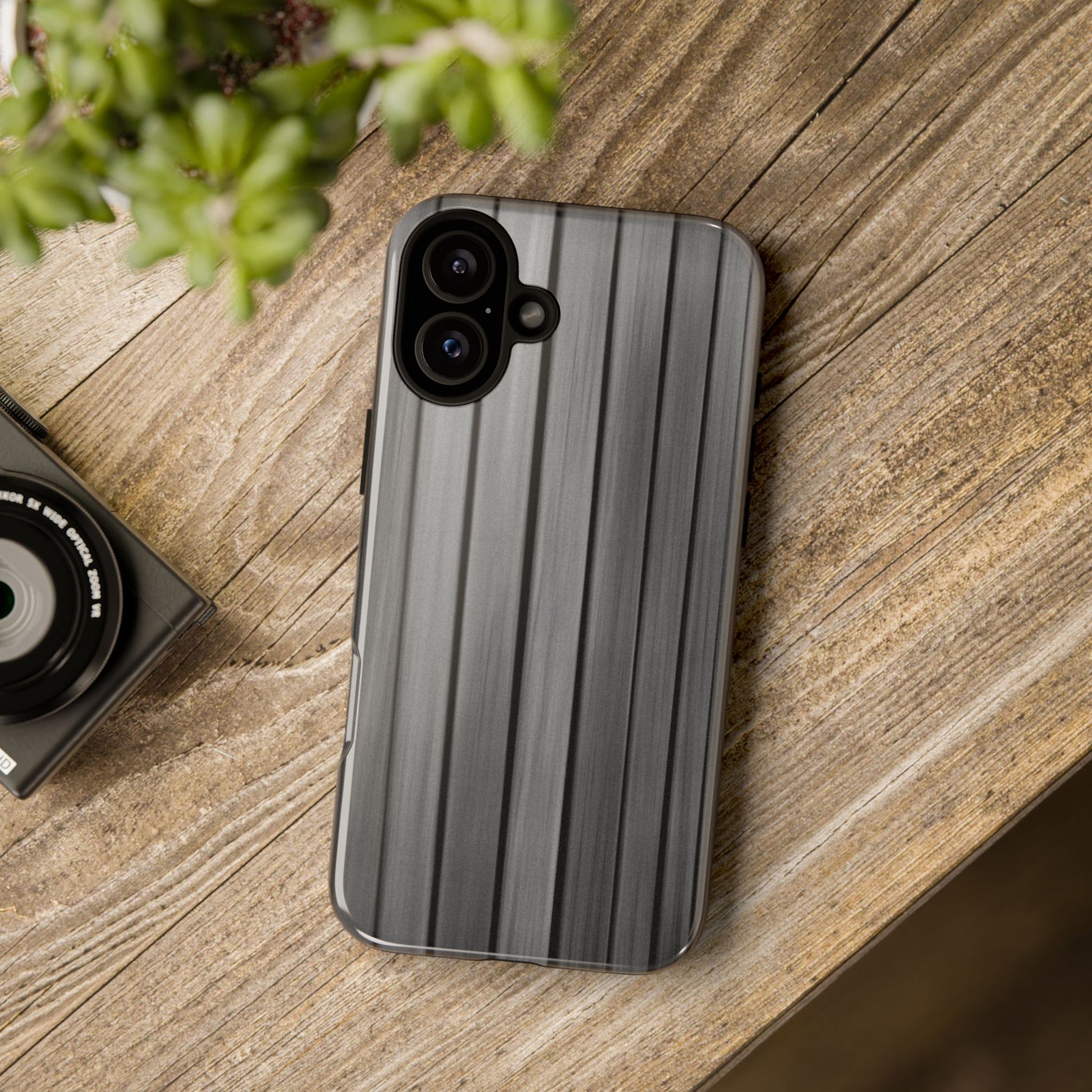 Ribbed metal texture phone case for iPhone, tough protective cover by Printify with durable metal-style design.