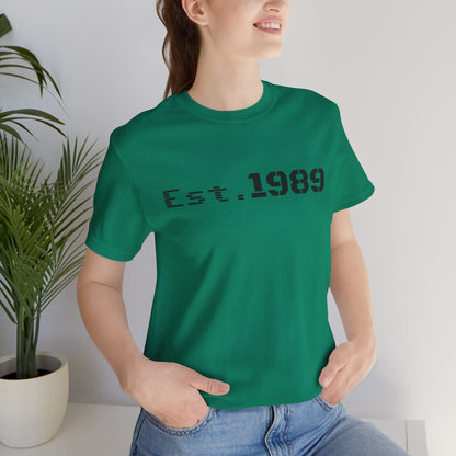 Vintage Est. 1989 graphic T-shirt by Printify featuring a retro year design on a casual cotton tee.