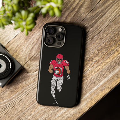 Black football player tough phone case for iPhone, featuring sports design and durable protective material by Printify.