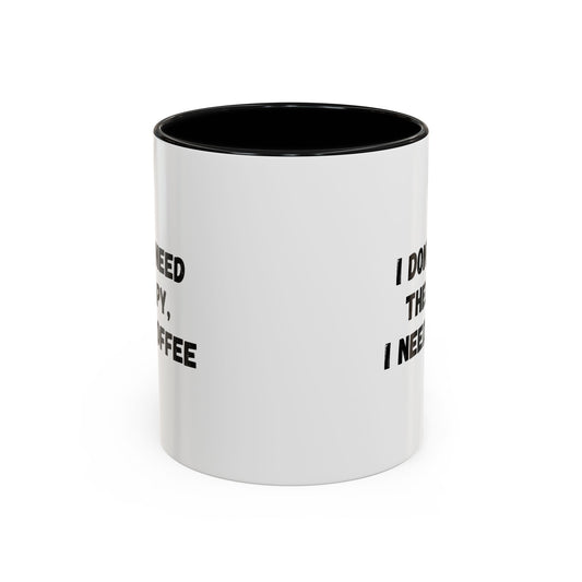 White ceramic mug with black text reading "I Don't Need Therapy, I Need Coffee" for coffee lovers, printed by Printify.