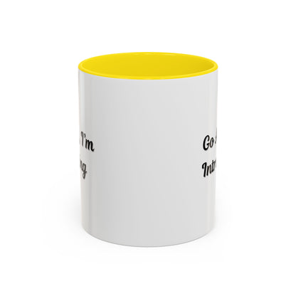 Ceramic coffee mug with "Go Away, I'm Introverting" text, 11 oz, in white with black lettering, perfect for introverts.