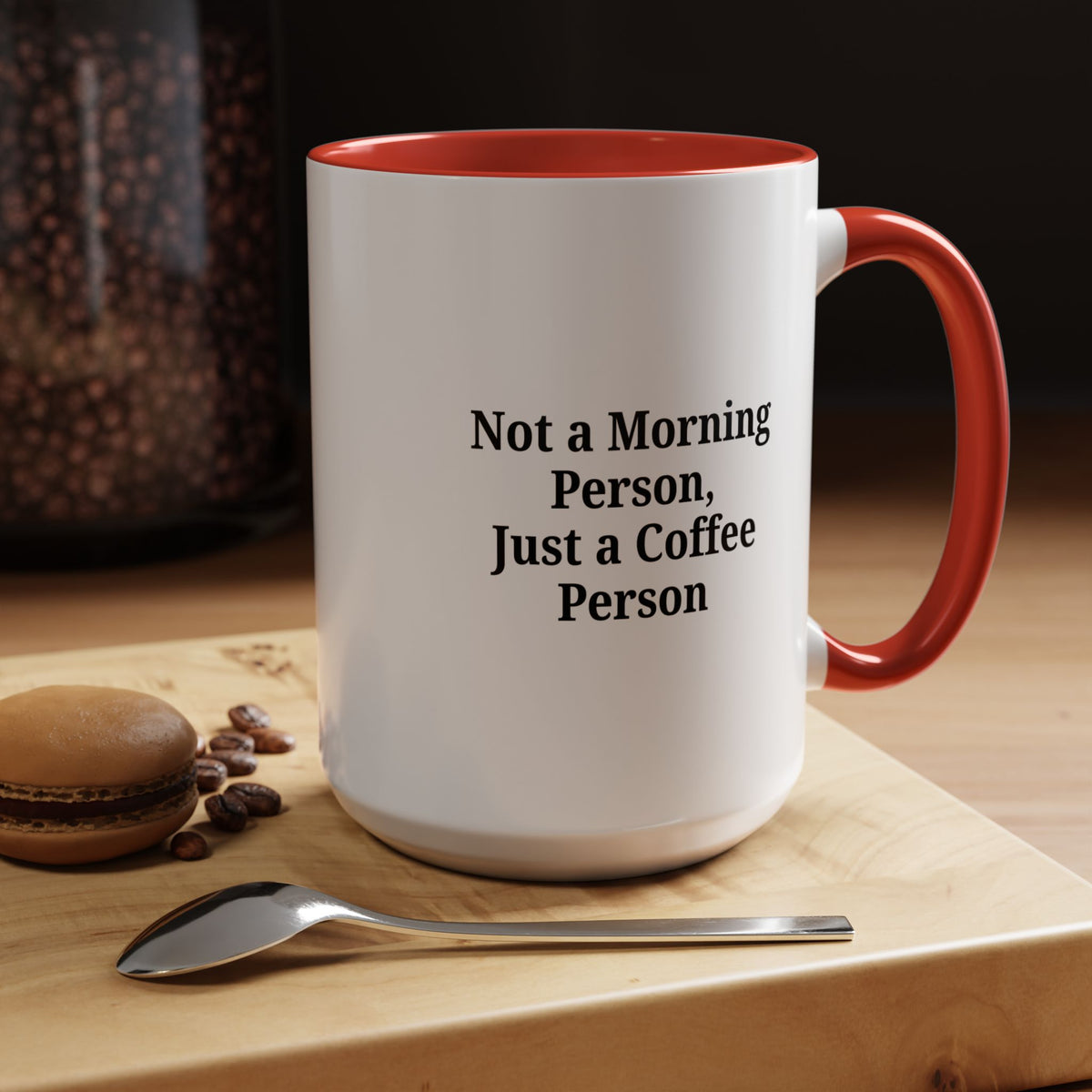 Ceramic coffee mug with "Not a Morning Person, Just a Coffee Person" text, perfect for morning beverages and daily use.