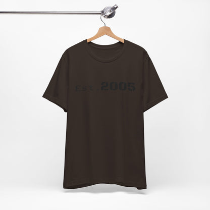 Black Est. 2005 Printify T-shirt with minimal anniversary year design, featuring simple text on a classic crewneck shirt.