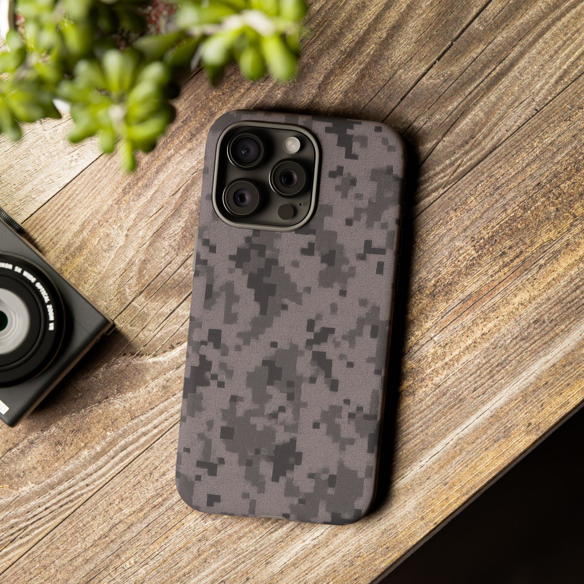 Gray digital camo phone case by Printify, tough protective cover for smartphones with camouflage pattern and durable design.