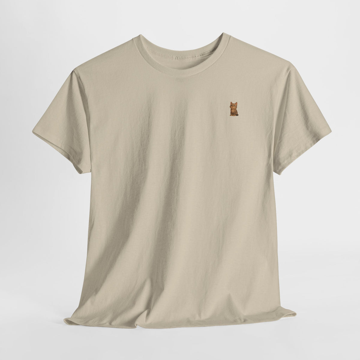 Cute brown kitten graphic T-shirt for cat lovers, featuring a cozy design on a stylish Printify T-shirt.
