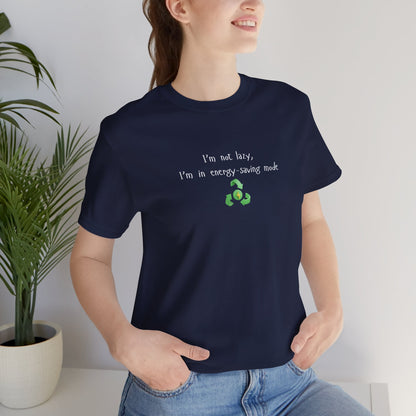 Eco-friendly mock T-shirt with humorous "I’m Not Lazy, I’m an Energy-Saving" print, casual fit, black fabric, printed by Printify.
