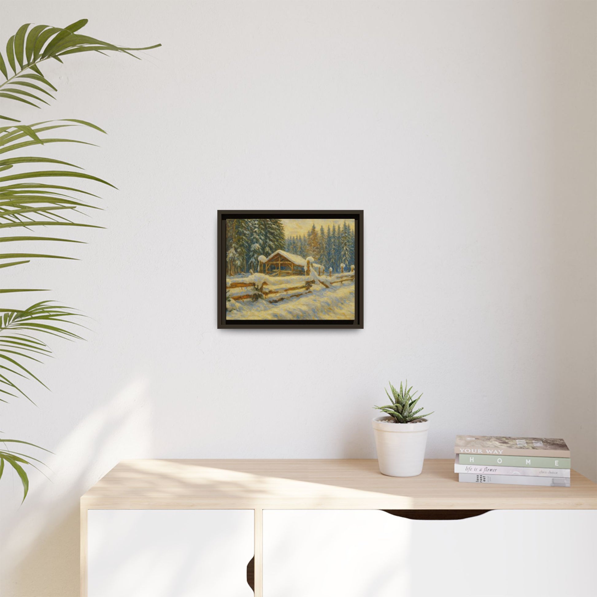 Snowy cabin winter landscape canvas wall art by Printify, featuring a matte framed print of a cozy cabin scene in snow.
