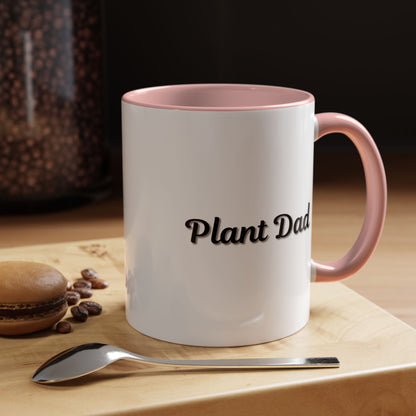 Black-handle Plant Dad coffee mug featuring plant-themed design, perfect for plant lovers, available in 11oz and 15oz sizes.