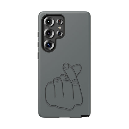 Silicone phone case with embossed Korean finger heart design, compatible with smartphones, by Printify.